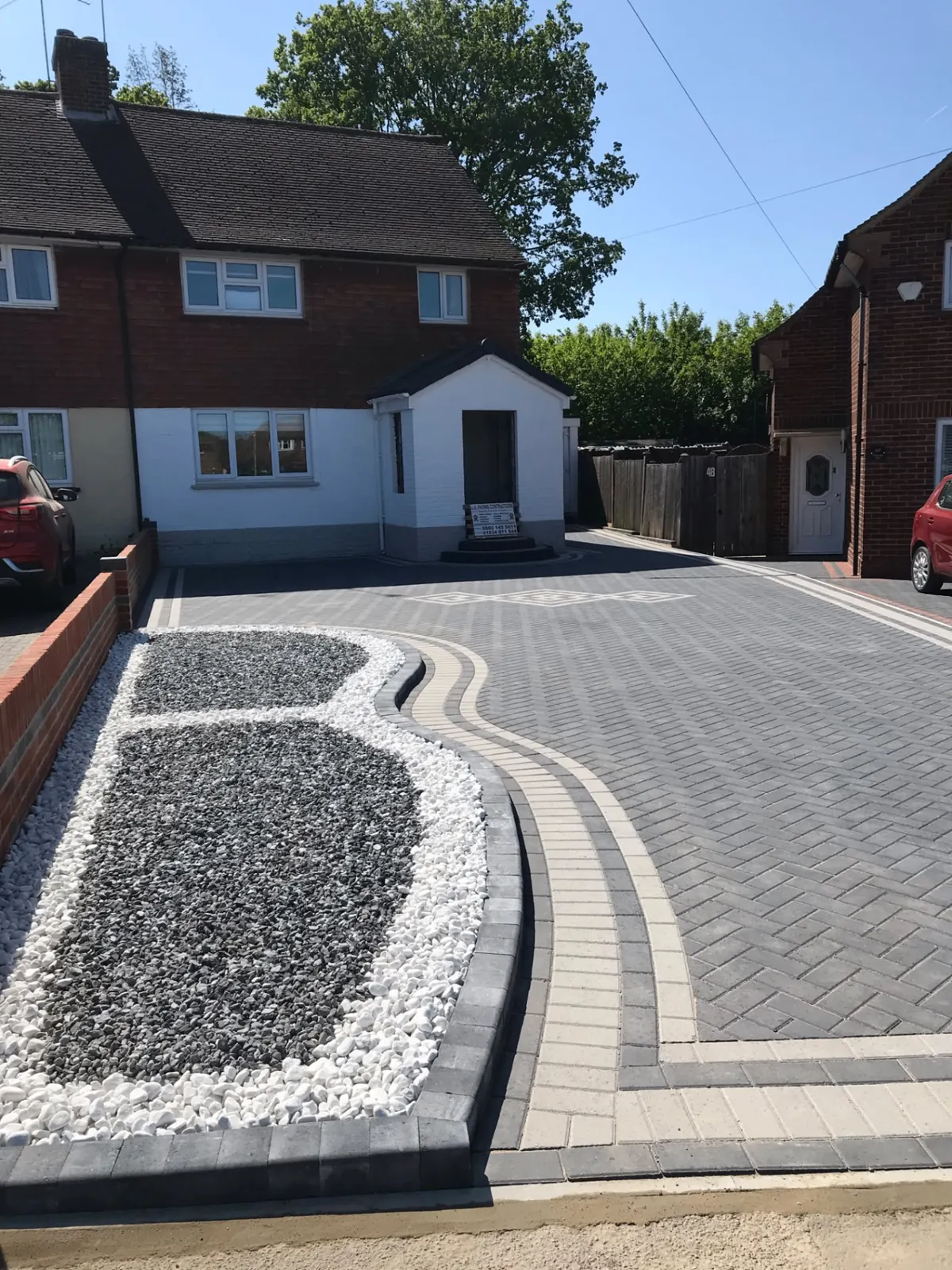 Landscaped garden with feature paving and border